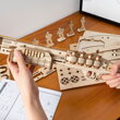 RoboTime Drevené 3D mechanické puzzle Brokovnica Terminátor, 2 hračky pre deti
