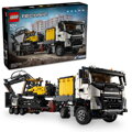 Nákladné auto Volvo FMX a elektrický bager EC230