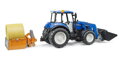 Bruder 2187 Traktor New Holland T5.120 s čelným nakladačom, korbou, vidlami a okrúhlym balíkom